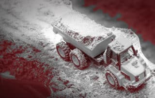 Spielzeuglastwagen mit Sand gefüllt